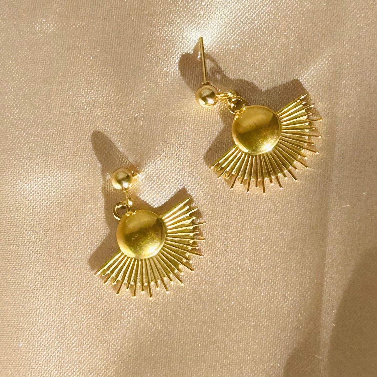 Sunburst charm