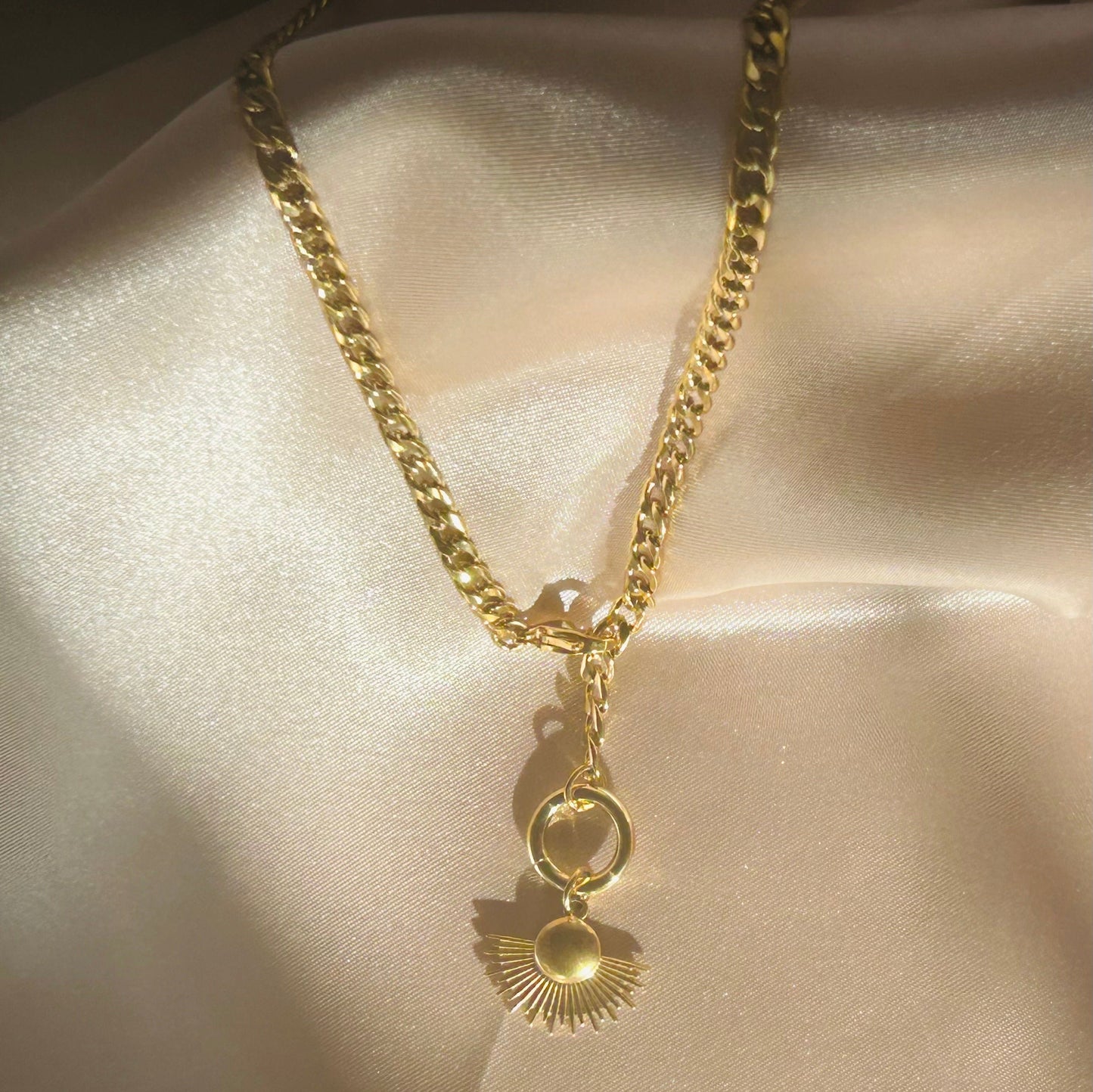 Sunburst charm