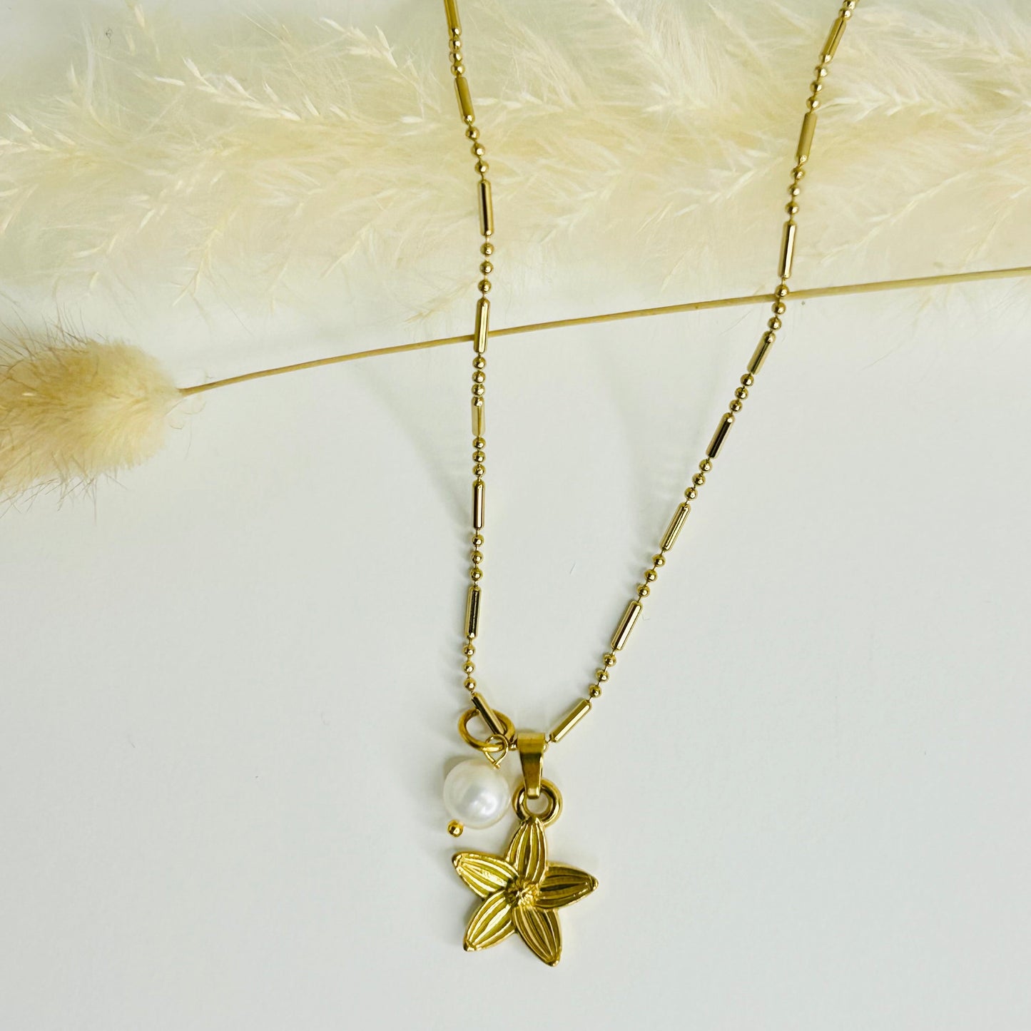 The Bloom Necklace- A golden reminder that healing and hope can bloom through any season.