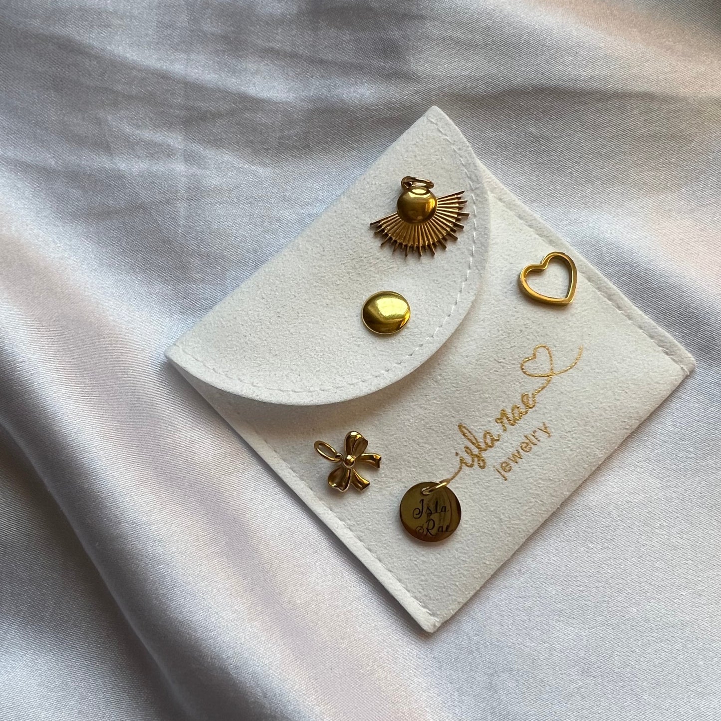 Mini bow charm