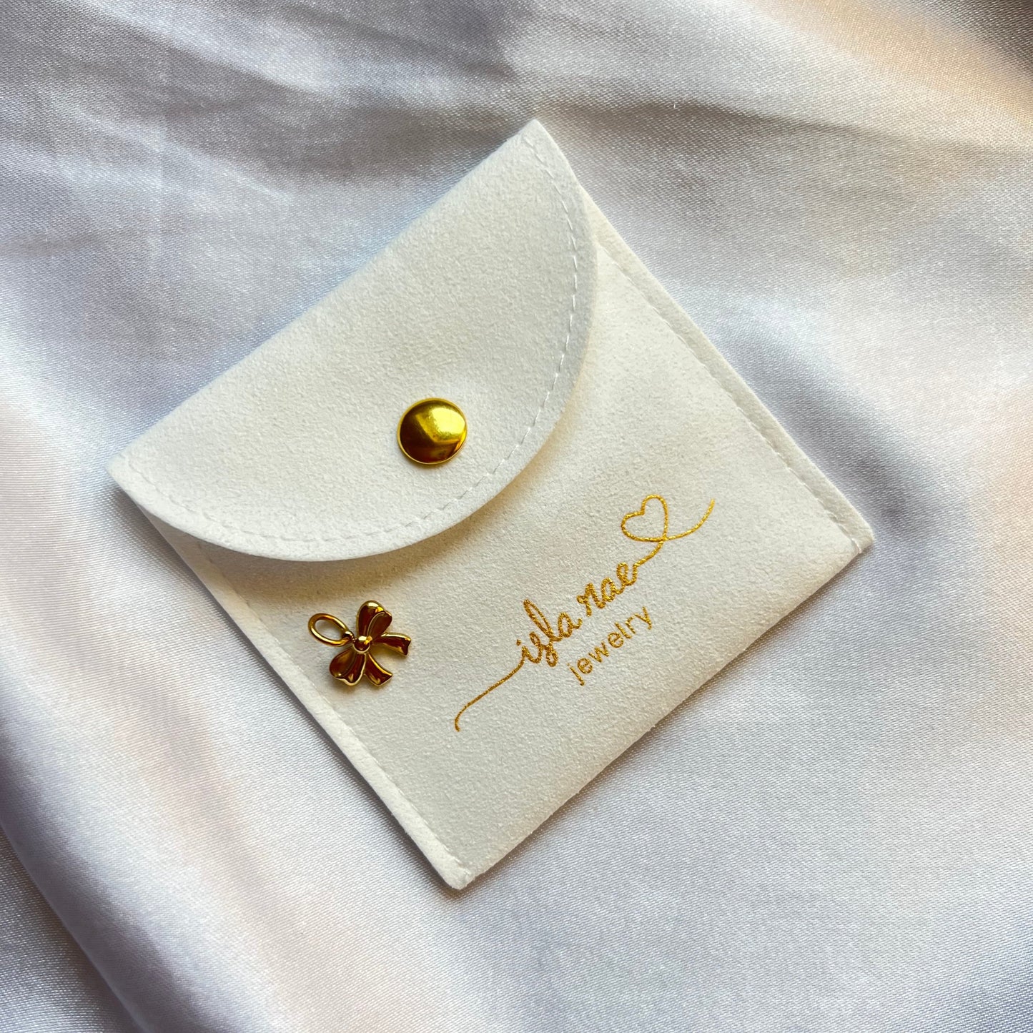 Mini bow charm