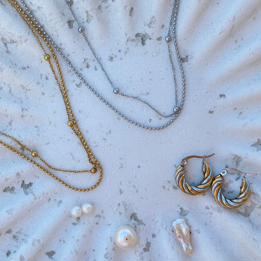 No tangling, no guessing. The Life’s Layers Set is a pre-layered gold and silver jewelry set designed for effortless everyday styling. Made to wear daily. two tone hoops, pre layer necklace, free stacking rings size 8. jewelry with meaning, mental health give back