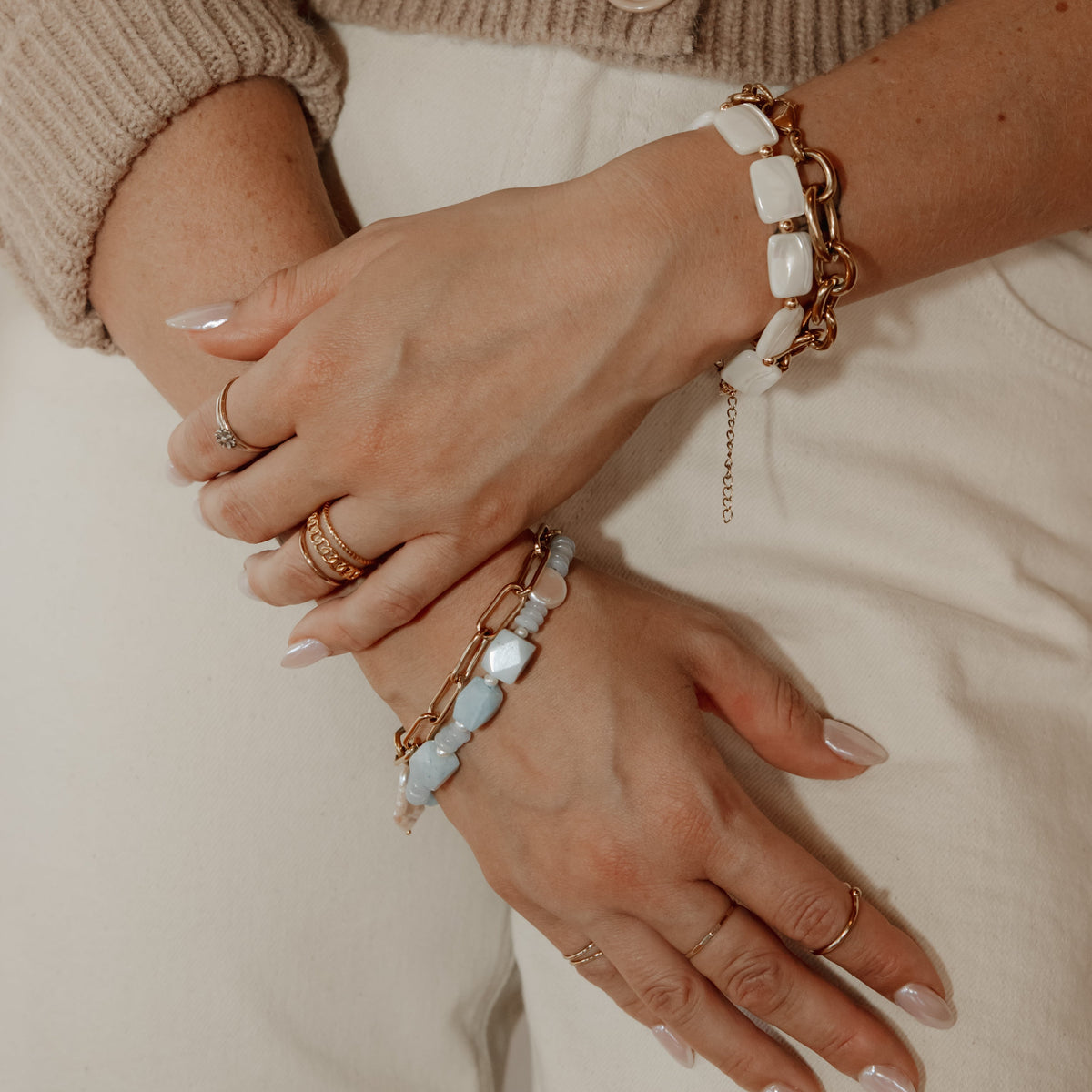 natural shell and stone, hand beaded in Saskatchewan Handmade Claire blue jade and pearl bracelet layered with gold jewelry