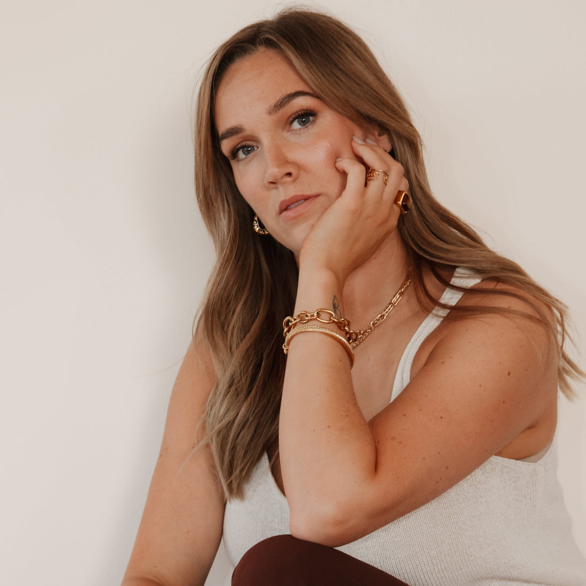 Rachel tiger eye gold statement ring worn by model